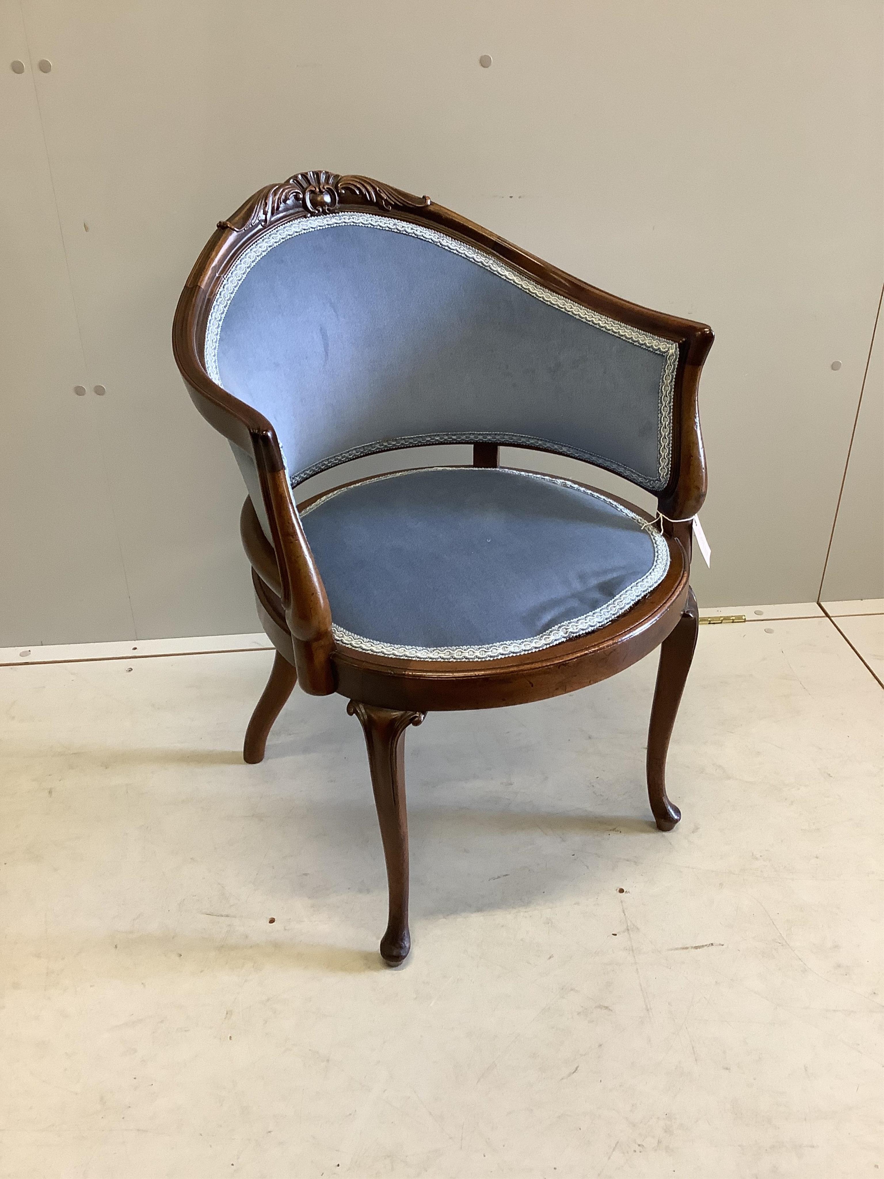 A carved and moulded mahogany show-wood frame tub chair, on cabriole legs, width 56cm, depth 52cm, height 78cm